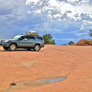 Family trip '08:  Bone stock and fully loaded.  Bureau of Land Management, Arizona desert, no roads, no GPS, rain clouds looming.