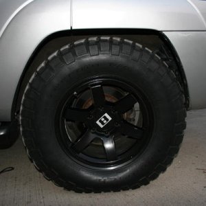 the 305/65-17 KM2s tuck nicely