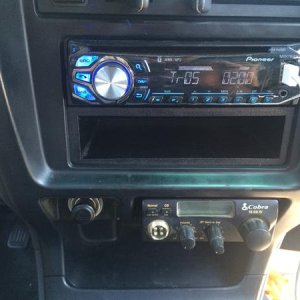 new cobra 19 dx iv mounted in the ashtray spot