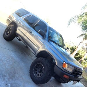 this is most current. Front windows tinted, tint strip on windshield, plastidipped fender flares, bumpers, grill, and emblems. About 200lbs of stuff i