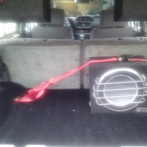 Custom mounted 6x9's in boxes on the roll bar