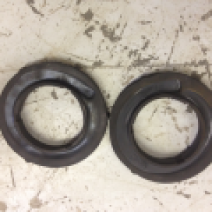 Taco strut top hat bushing next to the T4R bushing.