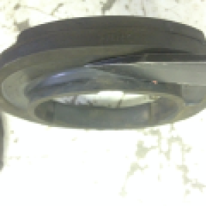 bushing rim that needs to be cut off one of the bushings in order to fit up against