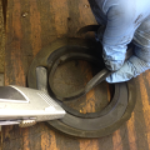 bushing rim that needs to be cut off one of the bushings in order to fit up against