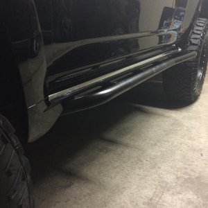 Took a bit more time then expected, but I decided to install the BudBuilt Bump Out sliders and "properly" trim my rockers to make them look OE. The dr