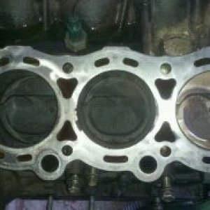this is the passenger head but again sure looks to me like the head gasket was blown as clean as that one piston is but toyota "said" it wasnt