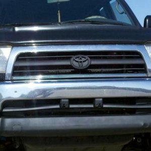 used krylon flat black to repaint bottom part of my bumper and grille and emblem