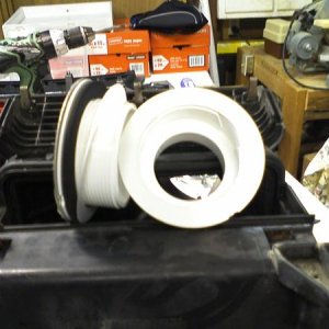 Fitting and plug with gaskets.