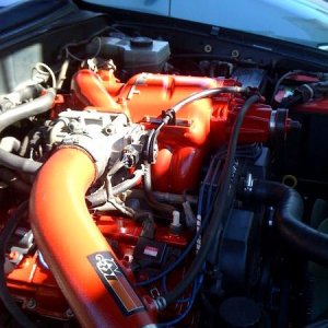 TRD supercharger repainted , k&n pipe repainted , and valve covers are painted.