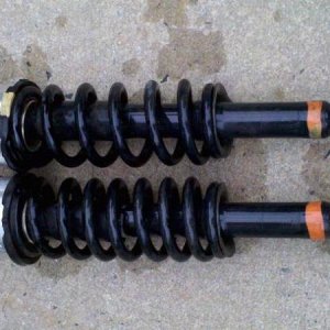 1999 coils with 3' toytec spacers!!! (Got these to level the rig out with the 7 rap LC`s in the back!)