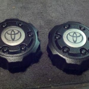 Had some leftover undercoating...decided to apply it to the faded center caps for my wheels.