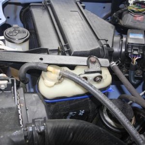 new position for radiator overflow bottle