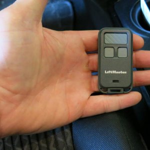 Key chain remote from Amazon for $20, $2 for velcro tape from home depot.