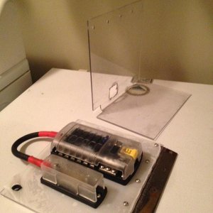 Lexan mount of fuse block and  Lexan 90deg base mounts under battery tray with 3m foam tape