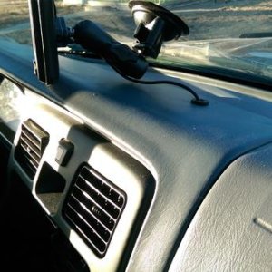 I had a crack develop in the dash and was starting to split. Solution: pilot a hole for the power cord to my GPS and place a grommet to finish the loo
