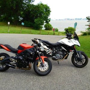 Can not wait for warmer weather! The boy's toy (KTM 990 SMT) and my Triumph Street Triple R