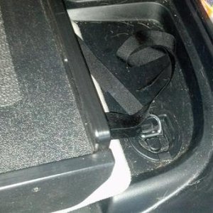 cargo slide side attachment- the rear attachment just hooks into the hooks behind the rear seats.