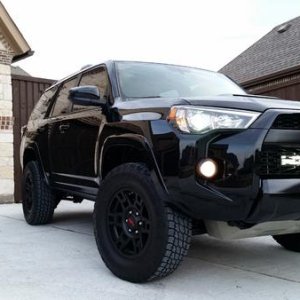 Spidertrax spacers are a must! They do rub a little though.