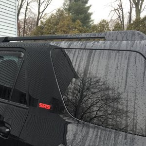 red SR5 to match TRD wheels, roof rail painted black