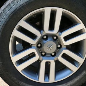 Original, stock wheels, 20", super condition, but I did upgrade tires to a slightly larger size - Michelin LTX MS/2 275/55/R20.  All four look like th