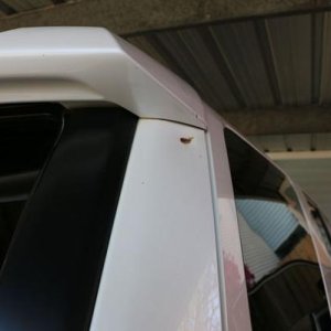 Small dent in rear hatch door;  bike fell from roof rack.  I never repaired it because it wasn't a big deal to me and I initially intended on keeping 