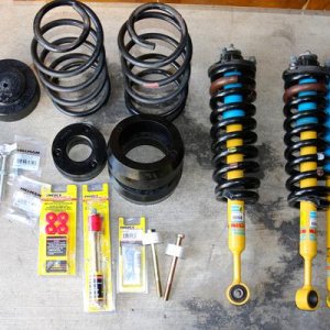 2014  Taco swap with fj rear springs, front budget boost spacer, 2 inch driver side rear/ 1.5 passenger spacer and customish end links. Poly sway bar 