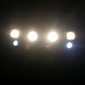 KC waterproof, shockproof, everything proof LED's in SW bumper and 5" Hella rounds installed, light up the night!
