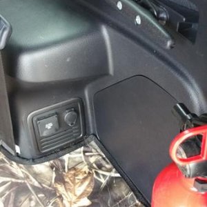 Installed plastic cleats on each side of the trunk to tie bags down or tie up dog leashes easier