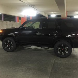 Bilsteins set at 1.75 in front and Bilsteins in the rear with 1" spacer. 285/65/18's with Toyo Open Country AT 2 10ply