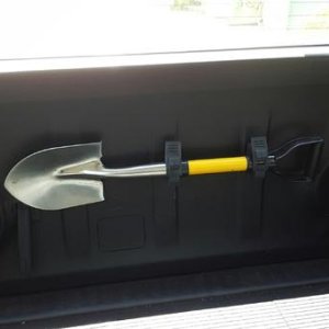Used QuickFist mounts on the rear hatch to hold a small shovel.