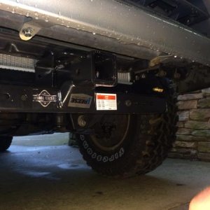 Front hitch install.  Reese universal hitch for winch cradle.  Better than nothing:)  Cannot afford new plate bumper!