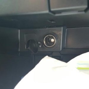 Installed constant power accessory outlet in glove box.