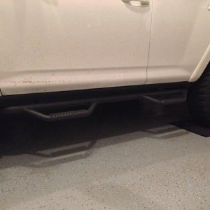 Wifey needed some steps especially with plans to lift. Enter Nfab. Also Goodyear Wrangler MTR in 285/70r17, relocated fender well and some very minor 