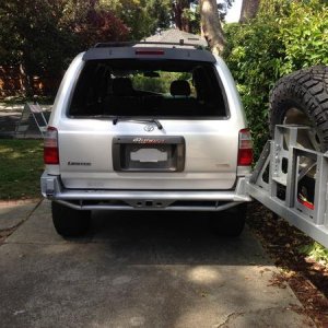Cbi rear hybrid bumper with tire carrier open