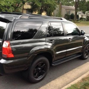 Blacked out chrome, de-badged, and painted wheels.