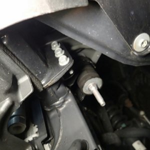 The infamous 3 frame rail bolts that need to be removed and reused to hold the brackets in place.