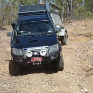 Friends Hilux pulling the Camp Kitchen - Had hot water, Stereo, washing up tubs, stove, lights, fridge ... basically I had to bring nothing but food.