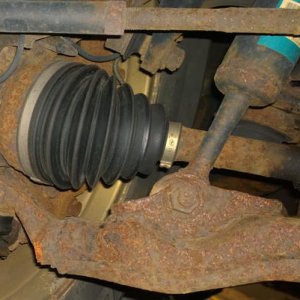 The inward boot was torn right behind the clamp ring.