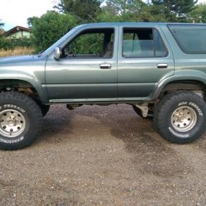 It took three weekends of grueling battle, but I managed to swap the tranny. Changed all fluids, tracked down a coolant leak, new battery, stuffed 35"