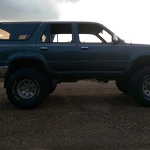 It took three weekends of grueling battle, but I managed to swap the tranny. Changed all fluids, tracked down a coolant leak, new battery, stuffed 35"