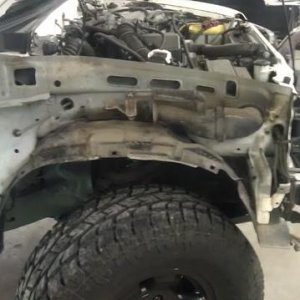 Had to pull the fender to the get the antenna hole welded up and painted