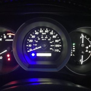 Interior cluster with LED changes, white w/white needles, and blue turn signals