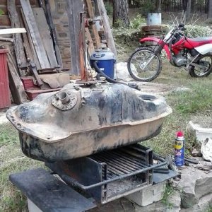 Pulled gas tank, it was gross inside.  Cleaned it all out.  Found we had to reuse the bracket for the fuel pump.
