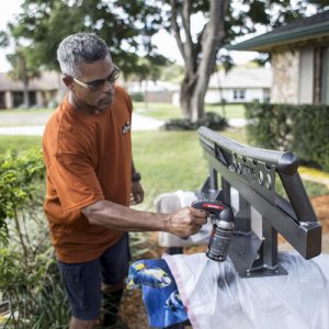 Applying our color coat after 3 coats of primer, we used Dupli Colors "storm gray metallic" on our new C4 Fab Rock Sliders