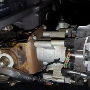 upper steering column, opposite of ignition side