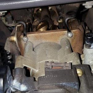 upper steering column, top between steering wheel and dash