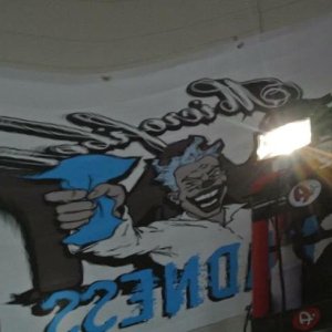 Reflection off of my T4R of a Banner on the wall