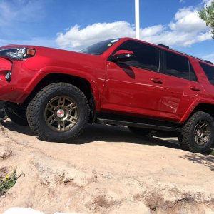 2015 4Runner Salsa Red with FN Wheels ƒ(x) Pro by FN Wheels and Cochrane Toyota in Cochrane, AB, Canada.