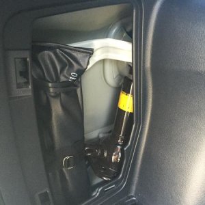 Step 7:  On the left side, remove the jack cover and cover to access the tail light bulbs. On the right side, just remove the access cover to the tail