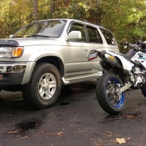 4Runner and DRZ400SM.

Stock tires (265/70r16) and no lift